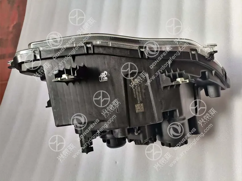 Built-In Mechanical Light Height Adjustment Pull Rod & Dust Cap Detail Right Combination Headlamp